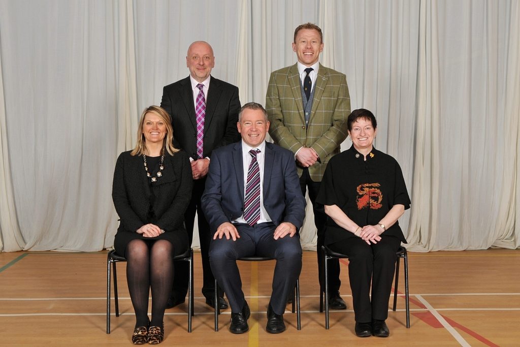 Senior Leadership Team. Left to right. Back row: Mr Nigel Cunningham, School Business Manager, Mr Steve Adams, Deputy Head (Pastoral & Guidance). Front row: Mrs Janette Scott-Laing, Deputy Head (Academic), Mr Donald J Shaw (Head), Miss Carole Phipps, Deputy Head (Pupil Support)